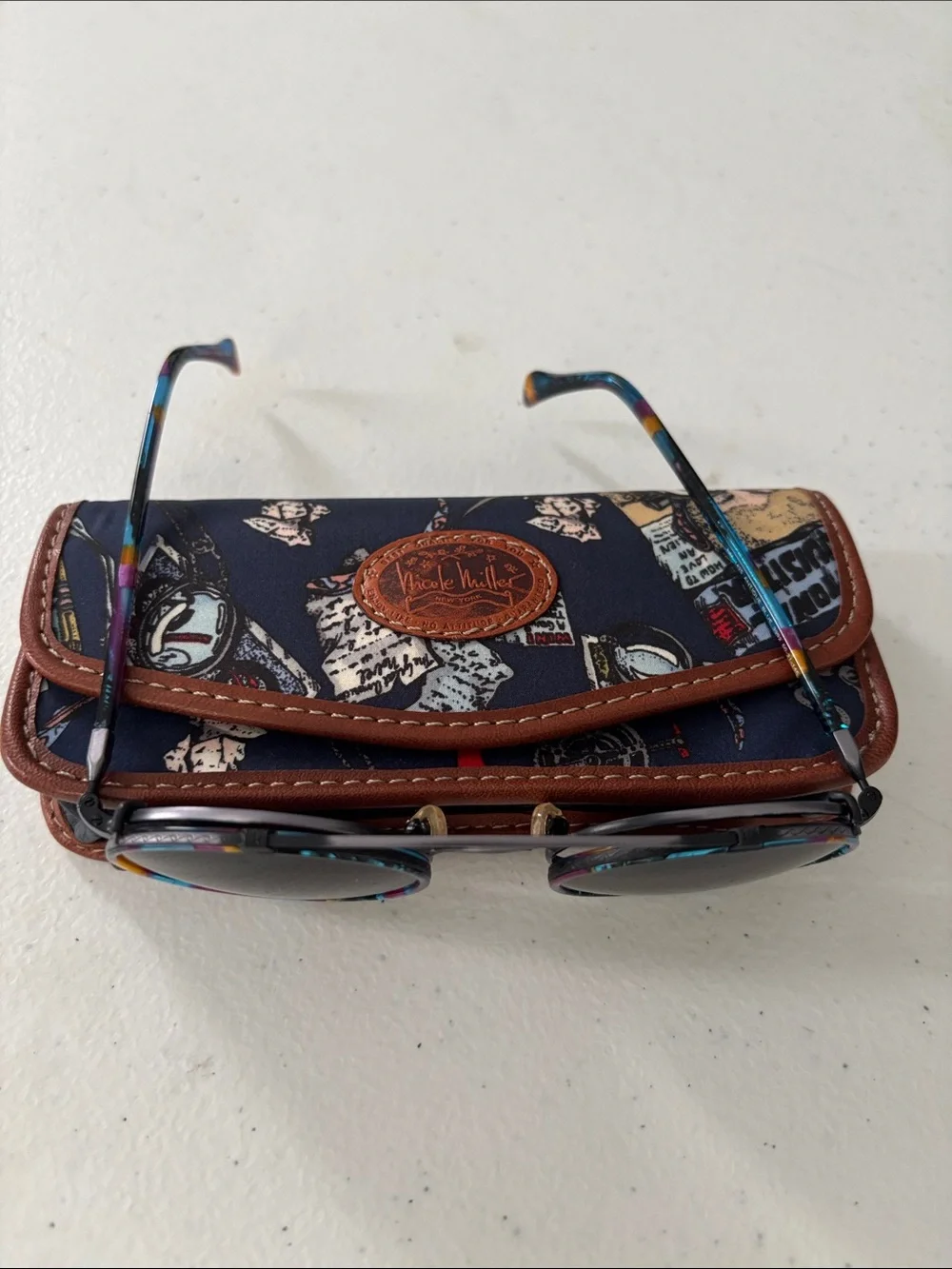 Navy Printed Eyewear Case with Brown Trim case and Glasses
